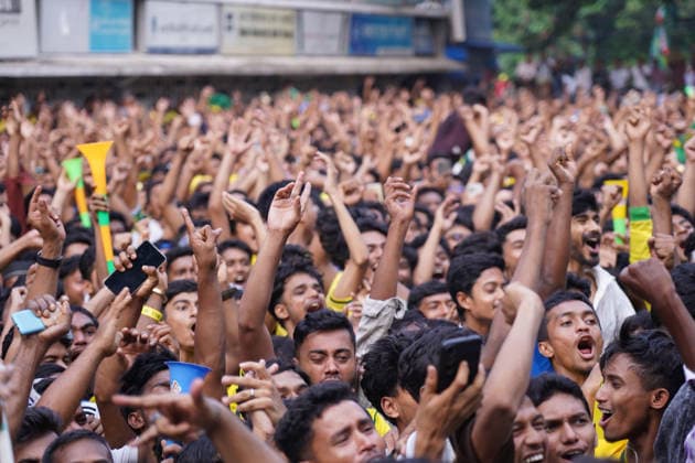 June 20, 2026, Dhaka, Dhaka, Bangladesh: Dhaka, Bangladesh, June 20, 2026: Football fans gather at the Teacher-Student Centre (TSC) of the University of Dhaka to watch the FIFA World Cup, WM, Weltmeisterschaft, Fussball match between Brazil and Haiti on a giant screen in Dhaka, Bangladesh. Thousands of supporters wearing Brazil s yellow and green colors cheered, waved flags, and celebrated throughout the match, creating a festive atmosphere at the venue. Following the game, jubilant fans took part in celebrations and victory processions, reflecting the enduring passion for football among Bangladeshi supporters. Dhaka Bangladesh - ZUMAk185 0859594209st Copyright: xRubelxKarmakerx