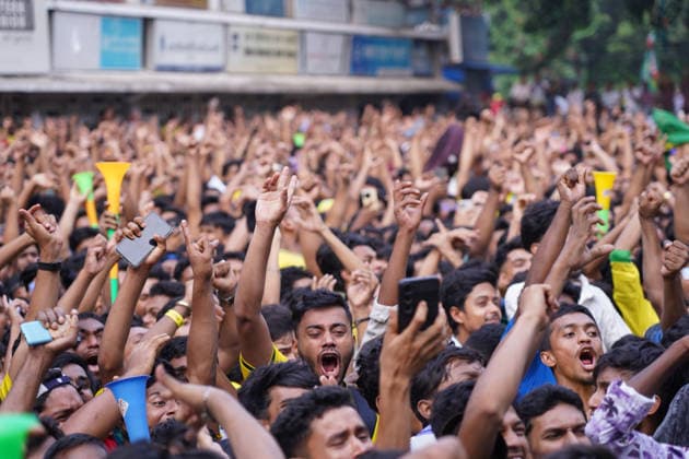 June 20, 2026, Dhaka, Dhaka, Bangladesh: Dhaka, Bangladesh, June 20, 2026: Football fans gather at the Teacher-Student Centre (TSC) of the University of Dhaka to watch the FIFA World Cup, WM, Weltmeisterschaft, Fussball match between Brazil and Haiti on a giant screen in Dhaka, Bangladesh. Thousands of supporters wearing Brazil s yellow and green colors cheered, waved flags, and celebrated throughout the match, creating a festive atmosphere at the venue. Following the game, jubilant fans took part in celebrations and victory processions, reflecting the enduring passion for football among Bangladeshi supporters. Dhaka Bangladesh - ZUMAk185 0859594212st Copyright: xRubelxKarmakerx