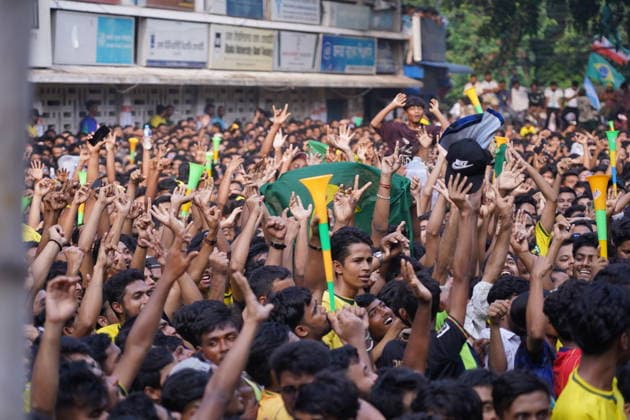 June 20, 2026, Dhaka, Dhaka, Bangladesh: Dhaka, Bangladesh, June 20, 2026: Football fans gather at the Teacher-Student Centre (TSC) of the University of Dhaka to watch the FIFA World Cup, WM, Weltmeisterschaft, Fussball match between Brazil and Haiti on a giant screen in Dhaka, Bangladesh. Thousands of supporters wearing Brazil s yellow and green colors cheered, waved flags, and celebrated throughout the match, creating a festive atmosphere at the venue. Following the game, jubilant fans took part in celebrations and victory processions, reflecting the enduring passion for football among Bangladeshi supporters. Dhaka Bangladesh - ZUMAk185 0859594316st Copyright: xRubelxKarmakerx