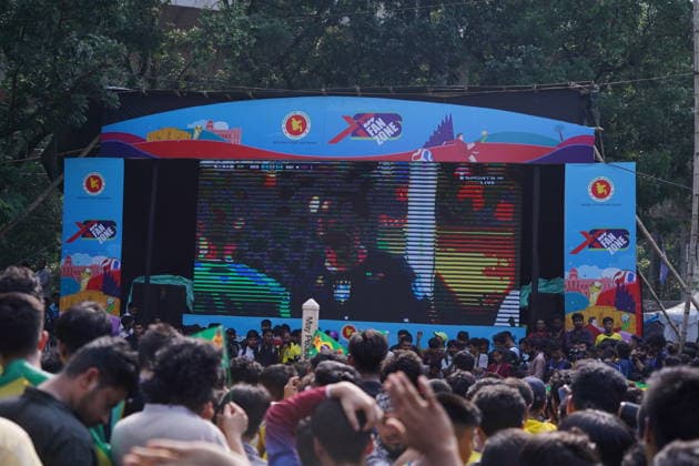 June 20, 2026, Dhaka, Dhaka, Bangladesh: Dhaka, Bangladesh, June 20, 2026: Football fans gather at the Teacher-Student Centre (TSC) of the University of Dhaka to watch the FIFA World Cup, WM, Weltmeisterschaft, Fussball match between Brazil and Haiti on a giant screen in Dhaka, Bangladesh. Thousands of supporters wearing Brazil s yellow and green colors cheered, waved flags, and celebrated throughout the match, creating a festive atmosphere at the venue. Following the game, jubilant fans took part in celebrations and victory processions, reflecting the enduring passion for football among Bangladeshi supporters. Dhaka Bangladesh - ZUMAk185 0859594391st Copyright: xRubelxKarmakerx