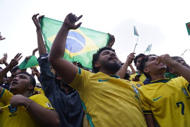 June 20, 2026, Dhaka, Dhaka, Bangladesh: Dhaka, Bangladesh, June 20, 2026: Football fans gather at the Teacher-Student Centre (TSC) of the University of Dhaka to watch the FIFA World Cup, WM, Weltmeisterschaft, Fussball match between Brazil and Haiti on a giant screen in Dhaka, Bangladesh. Thousands of supporters wearing Brazil s yellow and green colors cheered, waved flags, and celebrated throughout the match, creating a festive atmosphere at the venue. Following the game, jubilant fans took part in celebrations and victory processions, reflecting the enduring passion for football among Bangladeshi supporters. Dhaka Bangladesh - ZUMAk185 0859594392st Copyright: xRubelxKarmakerx
