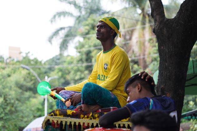 June 20, 2026, Dhaka, Dhaka, Bangladesh: Dhaka, Bangladesh, June 20, 2026: Football fans gather at the Teacher-Student Centre (TSC) of the University of Dhaka to watch the FIFA World Cup, WM, Weltmeisterschaft, Fussball match between Brazil and Haiti on a giant screen in Dhaka, Bangladesh. Thousands of supporters wearing Brazil s yellow and green colors cheered, waved flags, and celebrated throughout the match, creating a festive atmosphere at the venue. Following the game, jubilant fans took part in celebrations and victory processions, reflecting the enduring passion for football among Bangladeshi supporters. Dhaka Bangladesh - ZUMAk185 0859594418st Copyright: xRubelxKarmakerx