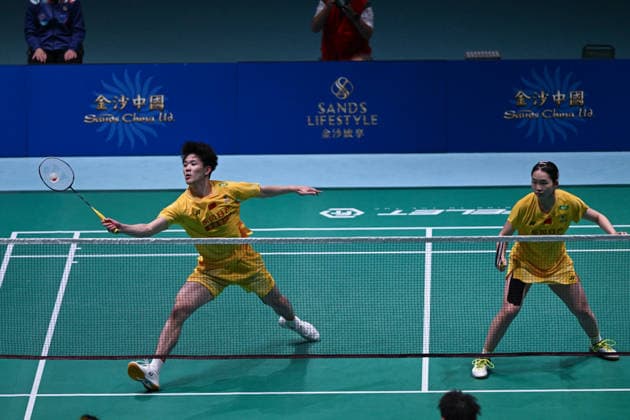MACAO, CHINA - JUNE 19: Li Hongyi and Huang Kexin of China compete in the Mixed Doubles Quarterfinal match against Jiang Zhenbang and Wei Yaxin of China on day 4 of Macao Open Badminton 2026 at Macao East Asian Games Dome on June 19, 2026 in Macau, China.  Copyright: xVCGx 111649290094