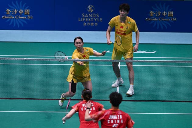 MACAO, CHINA - JUNE 19: Li Hongyi and Huang Kexin of China compete in the Mixed Doubles Quarterfinal match against Jiang Zhenbang and Wei Yaxin of China on day 4 of Macao Open Badminton 2026 at Macao East Asian Games Dome on June 19, 2026 in Macau, China.  Copyright: xVCGx 111649290095