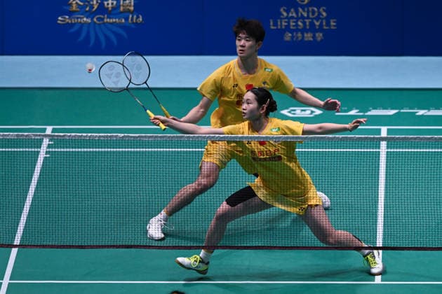 MACAO, CHINA - JUNE 19: Li Hongyi and Huang Kexin of China compete in the Mixed Doubles Quarterfinal match against Jiang Zhenbang and Wei Yaxin of China on day 4 of Macao Open Badminton 2026 at Macao East Asian Games Dome on June 19, 2026 in Macau, China.  Copyright: xVCGx 111649290091