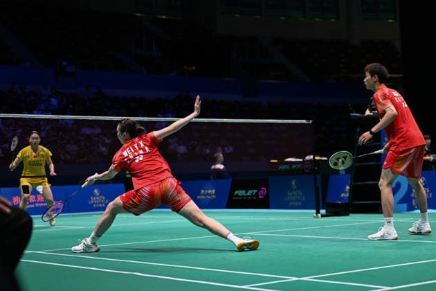 MACAO, CHINA - JUNE 19: Jiang Zhenbang and Wei Yaxin of China compete in the Mixed Doubles Quarterfinal match against Li Hongyi and Huang Kexin of China on day 4 of Macao Open Badminton 2026 at Macao East Asian Games Dome on June 19, 2026 in Macau, China.  Copyright: xVCGx 111649290079