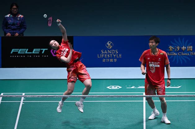 MACAO, CHINA - JUNE 19: Jiang Zhenbang and Wei Yaxin of China compete in the Mixed Doubles Quarterfinal match against Li Hongyi and Huang Kexin of China on day 4 of Macao Open Badminton 2026 at Macao East Asian Games Dome on June 19, 2026 in Macau, China.  Copyright: xVCGx 111649290081