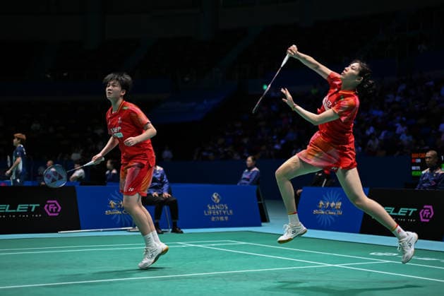 MACAO, CHINA - JUNE 19: Bao Lijing and Cao Zihan of China compete in the Women s Doubles Quarterfinal match against Yi En Hsieh and Teng Chun Hsun of Chinese Taipei on day 4 of Macao Open Badminton 2026 at Macao East Asian Games Dome on June 19, 2026 in Macao, China.  Copyright: xVCGx 111649293709
