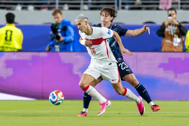 SANTA CLARA, CA - JUNE 19: Mert Muldur 18 of Turkiye is fouled by Matias Galarza 23 of Paraguay during the FIFA World Cup, WM, Weltmeisterschaft, Fussball 2026 Group D match between Turkiye and Paraguay on June 19, 2026 at San Francisco Bay Area Stadium in Santa Clara, CA. (Photo by Bob Kupbens Icon Sportswire) SOCCER: JUN 19 FIFA World Cup 26 Group D - Turkiye vs Paraguay EDITORIAL USE ONLY Icon260619052