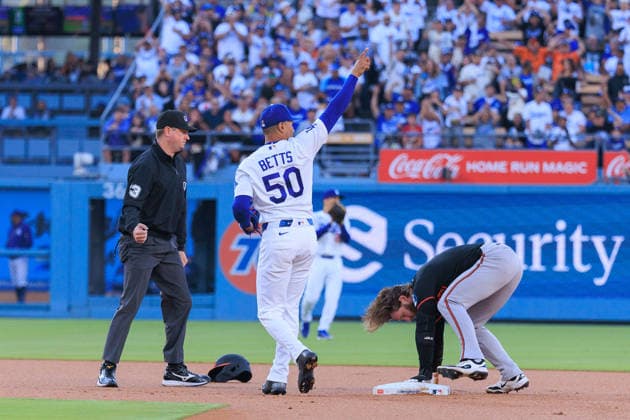 June 19, 2026, Los Angeles, California, USA: Mookie Betts 50 of the Los Angeles Dodgers catches the ball for an out on Taylor Ward 3 of the Baltimore Orioles on second base during a regular season MLB, Baseball Herren, USA game against the Baltimore Orioles on Friday June 19, 2026 at Dodger Stadium in Los Angeles, California. Dodgers defeat Orioles, 6-5. JAVIER ROJAS PI Los Angeles USA - ZUMAp124 20260619_zaa_p124_009 Copyright: xJavierxRojasx