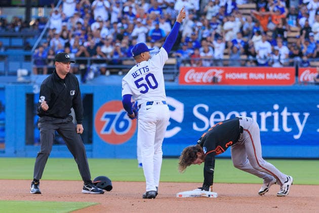 June 19, 2026, Los Angeles, California, USA: Mookie Betts 50 of the Los Angeles Dodgers catches the ball for an out on Taylor Ward 3 of the Baltimore Orioles on second base during a regular season MLB, Baseball Herren, USA game against the Baltimore Orioles on Friday June 19, 2026 at Dodger Stadium in Los Angeles, California. Dodgers defeat Orioles, 6-5. JAVIER ROJAS PI Dodgers Defeat Orioles, 6-5  - ZUMAp124 20260619_zaa_p124_008 Copyright: xJavierxRojasx