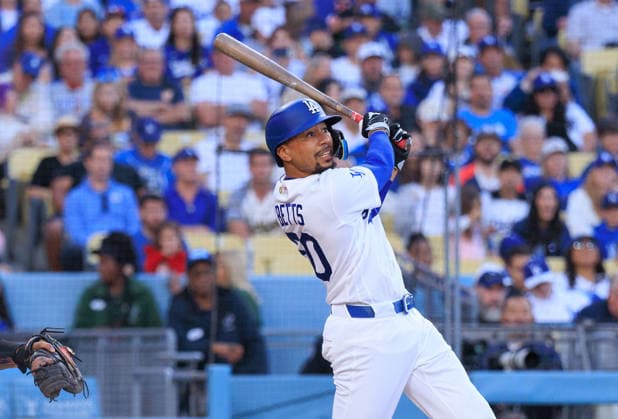 June 19, 2026, Los Angeles, California, USA: Mookie Betts 50 of the Los Angeles Dodgers hits a double during a regular season MLB, Baseball Herren, USA game against the Baltimore Orioles on Friday June 19, 2026 at Dodger Stadium in Los Angeles, California. Dodgers defeat Orioles, 6-5. JAVIER ROJAS PI Dodgers Defeat Orioles, 6-5  - ZUMAp124 20260619_zaa_p124_011 Copyright: xJavierxRojasx