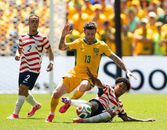 SEATTLE, WASHINGTON - JUNE 19: Weston McKennie of United States tackles Aiden O Neill of Australia during the FIFA World Cup, WM, Weltmeisterschaft, Fussball 2026 Group D match between USA and Australia at Seattle Stadium on June 19, 2026 in Seattle, Washington.  Copyright: xMBxMediax