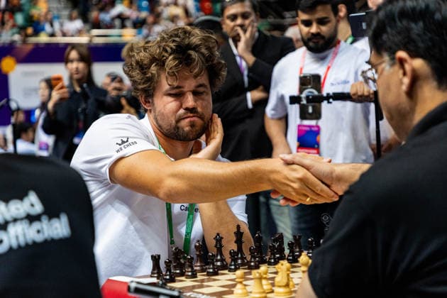 June 20, 2026, Hong Kong, Hong Kong, China: Chess Grandmasters MAGNUS CARLSEN (NOR) and VISWANATHAN ANAND (IND) duel in a Blitz match at the 2026 FIDE World Team Rapid and Blitz Chess Championship in Hong Kong.Chess Hong Kong China - ZUMAm298 0859595891st Copyright: xJamesxModestox