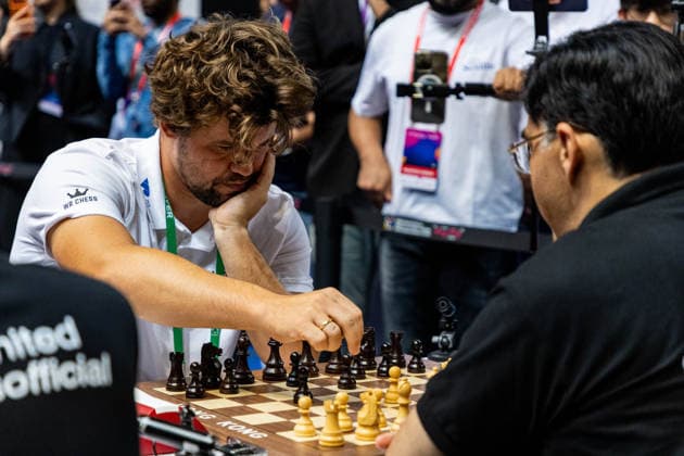 June 20, 2026, Hong Kong, Hong Kong, China: Chess Grandmasters MAGNUS CARLSEN (NOR) and VISWANATHAN ANAND (IND) duel in a Blitz match at the 2026 FIDE World Team Rapid and Blitz Chess Championship in Hong Kong.Chess Hong Kong China - ZUMAm298 0859595929st Copyright: xJamesxModestox