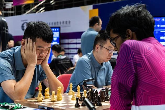June 20, 2026, Hong Kong, Hong Kong, China: Chess Grandmasters DING LIREN (CHI) and RAMESHBABU PRAGGNANANDHAA (IND) duel in a Blitz match at the 2026 FIDE World Team Rapid and Blitz Chess Championship in Hong Kong.Chess Hong Kong China - ZUMAm298 0859596358st Copyright: xJamesxModestox