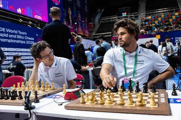 June 20, 2026, Hong Kong, Hong Kong, China: Chess Grandmasters FABIANO CARUANA (USA) and MAGNUS CARLSEN (NOR) talk before a Blitz match at the 2026 FIDE World Team Rapid and Blitz Chess Championship in Hong Kong. Hong Kong China - ZUMAm298 0859596864st Copyright: xJamesxModestox