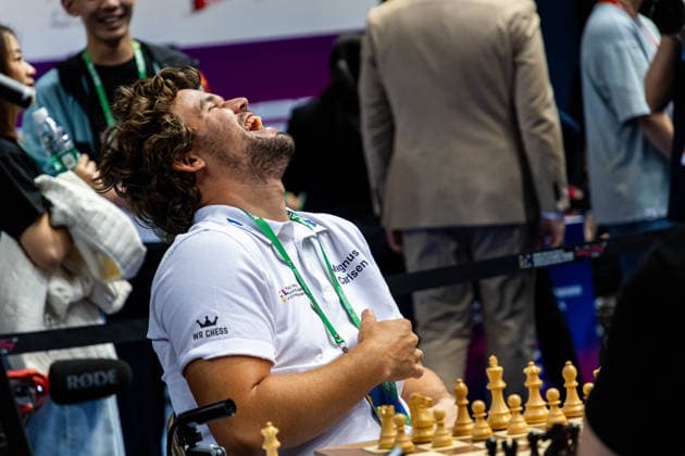 June 20, 2026, Hong Kong, Hong Kong, China: Chess Grandmaster MAGNUS CARLSEN (NOR) laughs while talking with his teammates about chess before a Blitz match at the 2026 FIDE World Team Rapid and Blitz Chess Championship in Hong Kong. Hong Kong China - ZUMAm298 0859596930st Copyright: xJamesxModestox