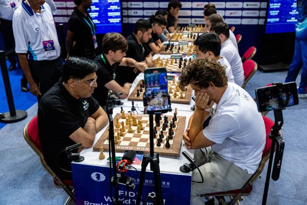 June 20, 2026, Hong Kong, Hong Kong, China: Chess Grandmasters MAGNUS CARLSEN (NOR) and VISWANATHAN ANAND (IND) duel in a Blitz match at the 2026 FIDE World Team Rapid and Blitz Chess Championship in Hong Kong. Hong Kong China - ZUMAm298 0859596947st Copyright: xJamesxModestox
