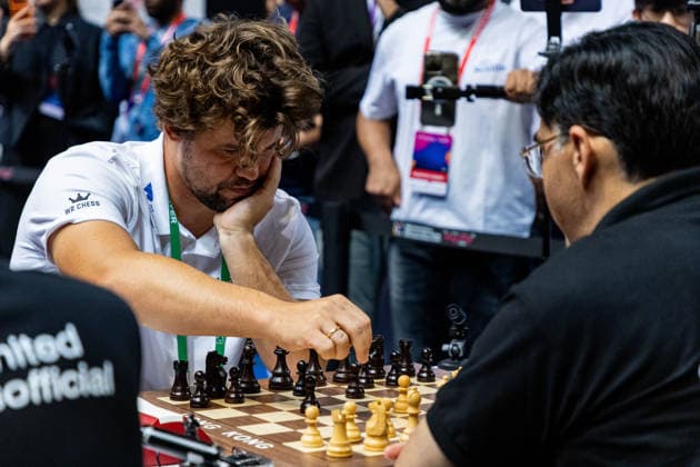 June 20, 2026, Hong Kong, Hong Kong, China: Chess Grandmasters MAGNUS CARLSEN (NOR) and VISWANATHAN ANAND (IND) duel in a Blitz match at the 2026 FIDE World Team Rapid and Blitz Chess Championship in Hong Kong. Hong Kong China - ZUMAm298 0859596952st Copyright: xJamesxModestox