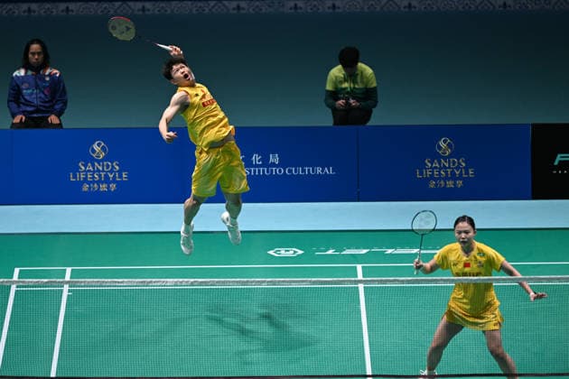 MACAO, CHINA - JUNE 18: Zhu Yijun and Li Qian of China compete in the Mixed Doubles Round of 16 match against Liew Xun and Ho Lo Ee of Malaysia on day 3 of Macao Open Badminton 2026 at Macao East Asian Games Dome on June 18, 2026 in Macao, China.  Copyright: xVCGx 111648947137