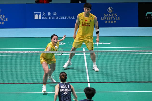 MACAO, CHINA - JUNE 18: Zhu Yijun and Li Qian of China compete in the Mixed Doubles Round of 16 match against Liew Xun and Ho Lo Ee of Malaysia on day 3 of Macao Open Badminton 2026 at Macao East Asian Games Dome on June 18, 2026 in Macao, China.  Copyright: xVCGx 111648947138