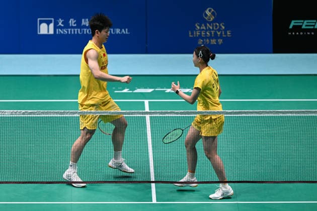MACAO, CHINA - JUNE 18: Zhu Yijun and Li Qian of China compete against Liu Xun and He Ruoyi of China during the mixed doubles round of 16 match at the Macau Badminton Open 2026 on June 18, 2026 in Macau, China.  Copyright: xVCGx 111648947133