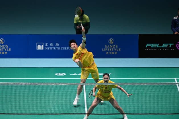 MACAO, CHINA - JUNE 18: Zhu Yijun and Li Qian of China compete in the Mixed Doubles Round of 16 match against Liew Xun and Ho Lo Ee of Malaysia on day 3 of Macao Open Badminton 2026 at Macao East Asian Games Dome on June 18, 2026 in Macao, China.  Copyright: xVCGx 111648947132
