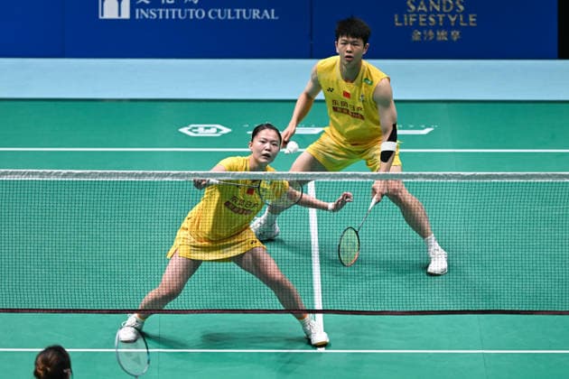 MACAO, CHINA - JUNE 18: Zhu Yijun and Li Qian of China compete in the Mixed Doubles Round of 16 match against Liew Xun and Ho Lo Ee of Malaysia on day 3 of Macao Open Badminton 2026 at Macao East Asian Games Dome on June 18, 2026 in Macao, China.  Copyright: xVCGx 111648947123