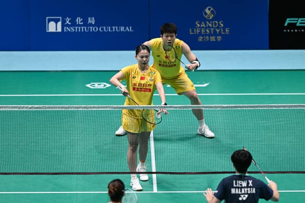 MACAO, CHINA - JUNE 18: Zhu Yijun and Li Qian of China compete in the Mixed Doubles Round of 16 match against Liew Xun and Ho Lo Ee of Malaysia on day 3 of Macao Open Badminton 2026 at Macao East Asian Games Dome on June 18, 2026 in Macao, China.  Copyright: xVCGx 111648947122