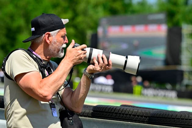 Czech Republic motorcycle Grand Prix, MotoGP World Championship, WM, Weltmeisterschaft qualification MotoGP, in Brno, Czech Republic, on June 20, 2026. Czech President Petr Pavel takes a photo of the riders on the track. (CTKxPhoto VaclavxSalek) CTKPhotoP2026062002959  CTKPhotoP2026062002959