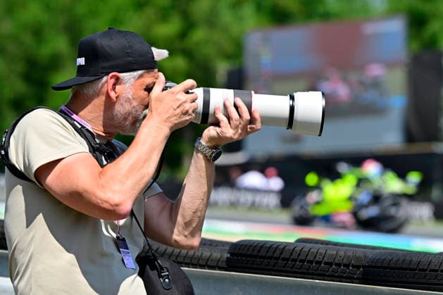 Czech Republic motorcycle Grand Prix, MotoGP World Championship, WM, Weltmeisterschaft qualification MotoGP, in Brno, Czech Republic, on June 20, 2026. Czech President Petr Pavel takes a photo of the riders on the track. (CTKxPhoto VaclavxSalek) CTKPhotoP2026062002960  CTKPhotoP2026062002960