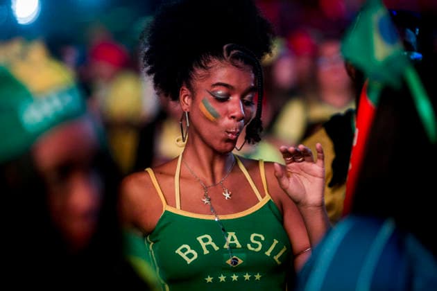 (260620) -- RIO DE JANEIRO, June 20, 2026 -- A Brazilian football fan dances while watching the live broadcast of the group C match between Brazil and Haiti at the 2026 FIFA World Cup, WM, Weltmeisterschaft, Fussball at the Copacabana Beach in Rio de Janeiro, Brazil, on June 19, 2026. (Photo by Xinhua) (SP)BRAZIL-RIO DE JANEIRO-FOOTBALL-FIFA WORLD CUP-FANS DanielxRamalho 