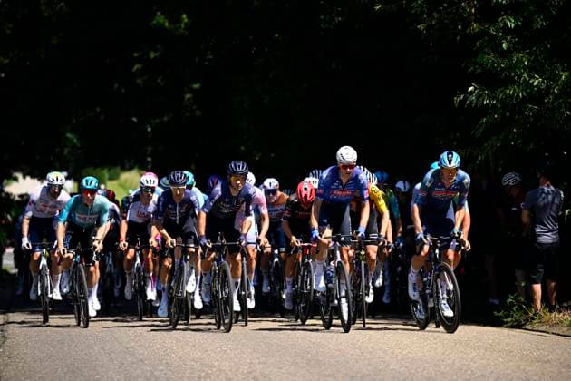 Baloise Belgium Tour 2026 Stage 4 AARSCHOT, BELGIUM - JUNE 20 : Riders of Pinarello Q36.5 Pro Cycling Team, Team Alpecin - Premier Tech, Team Soudal Quick-Step in the peloton during stage 4 of the 95th edition of Baloise Tour of Belgium an UCI ProSeries 2.Pro cycling road race stage for Men Elite of 183.5 km with start in Begijnendijk and finish in Aarschot on June 20, 2026 in Aarschot, Belgium, 20 06 2026 ( Motordriver Stephan Boone - Aarschot Belgium  Copyright: xTomasxSiskx