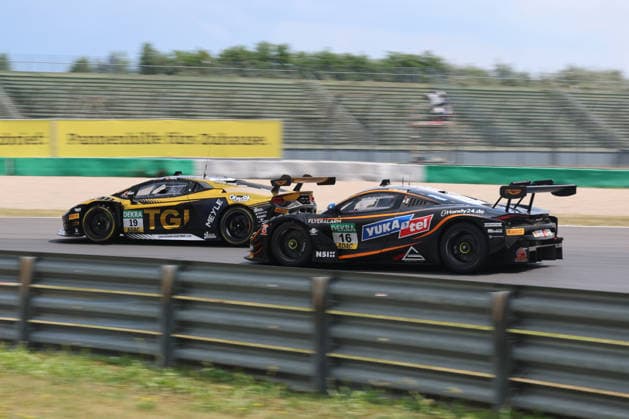 Mirko Bortolotti (I TGI Team by GRT, 19), Lamborghini Temerario GT3 in front of Timo Glock (D Dörr Motorsport, 16), McLaren 720S GT3 Evo, DTM (German Touring Car Championship) - Round 3 - Race 1, DEKRA Lausitzring on 20.06.2026. Brandenburg Deutschland Copyright: xO.Frankex