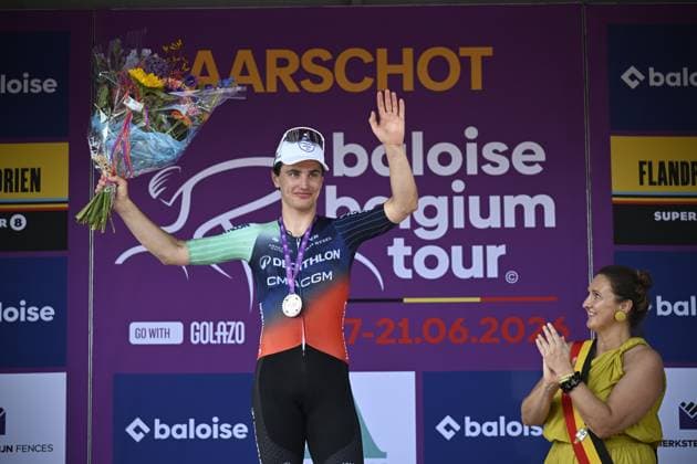 Dutch Olav Kooij of Decathlon CMA CGM Team and Aarschot Mayor Gwendolyn Rutten pictured on the podium of stage 4 of the Baloise Belgium Tour cycling race, 183,5km from Begijnendijk to Aarschot, on Saturday 20 June 2026. The Baloise Belgium Tour takes place from 17 to 21 June. JASPERxJACOBS  x178479045x