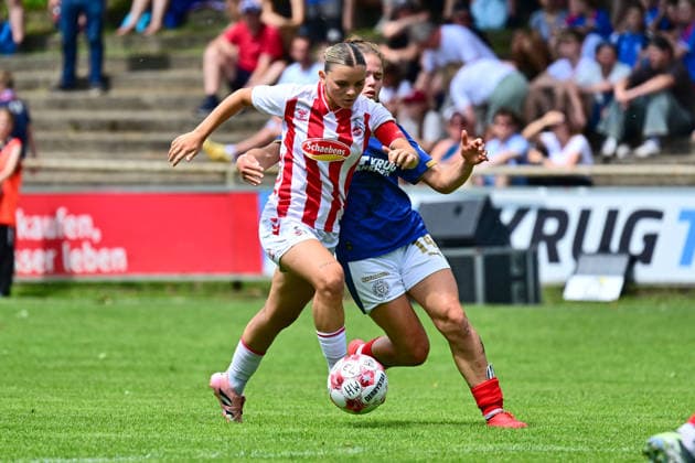 20.06.2026, Fußball, Frauen, Regionalliga, Relagation zur 2. Bundesliga, Saison 2025 2026, Holstein Kiel - 1. FC Köln, Holstein Women Kölns Antonia Langshausen gegen Kiels Zoe Luisa Tolksdorf Kiel, Holstein-Stadion Waldwiese, VfB Kiel Platz Schleswig-Holstein Deutschland *** June 20, 2026, Soccer, Womens, Regional League, Promotion Relegation Playoffs to the 2. Bundesliga, 2025–2026 Season, Holstein Kiel vs. 1. FC Köln, Holstein Women