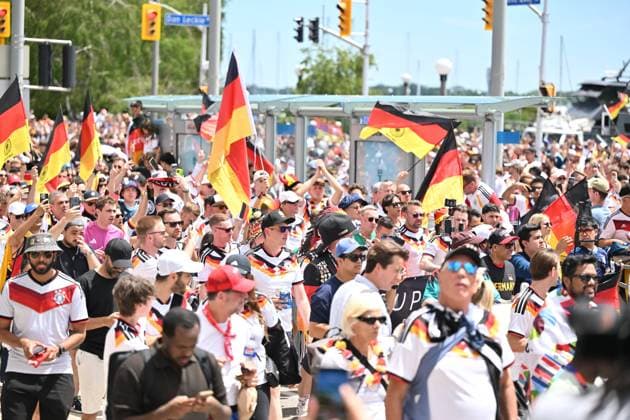 June 20, 2026, Toronto, On, Canada: Team Germany fans march toward Toronto Stadium before their team takes on Ivory Coast in World Cup soccer action in Toronto on Saturday, June 20, 2026. Canada News - June 20, 2026  - ZUMAc35_ 20260620_zaf_c35_003 Copyright: xJonxBlackerx