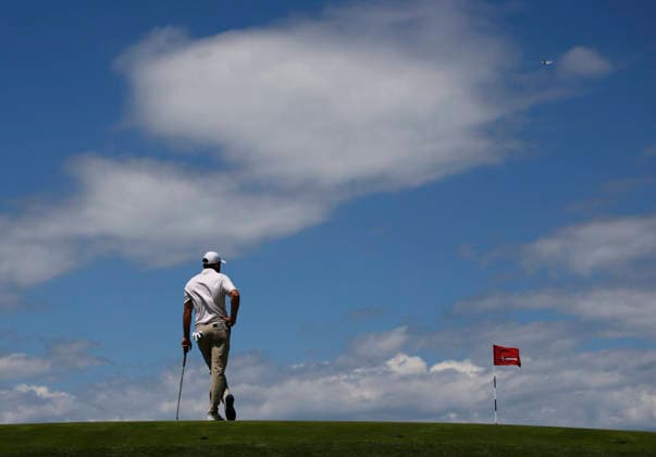 Scottie Scheffler waits to putt on the first hole in the third round of the 126th U.S. Open Golf Championship at Shinnecock Hills Golf Club in Southampton, NY on Saturday, June 20, 2026.  NYC202606202011 JOHNxANGELILLO