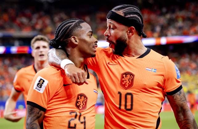 HOUSTON - (lr) Crysencio Summerville of the Netherlands and Memphis Depay of the Netherlands celebrate after the 5-1 victory over Sweden during the FIFA 2026 World Cup Group F match between the Netherlands and Sweden at Houston Stadium on June 20, 2026, in Houston, United States. ROBIN VAN LONKHUIJSEN ANP FIFA World Cup, WM, Weltmeisterschaft, Fussball 2026 group stage 2026 xVIxANPxSportx xxANPxIVx 561537570 originalFilename: 561537570.jpg