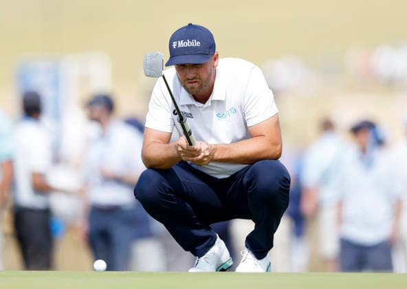 Wyndham Clark lines ups a putt on the first hole in the third round of the 126th U.S. Open Golf Championship at Shinnecock Hills Golf Club in Southampton, NY on Saturday, June 20, 2026.  NYC202606202014 JOHNxANGELILLO