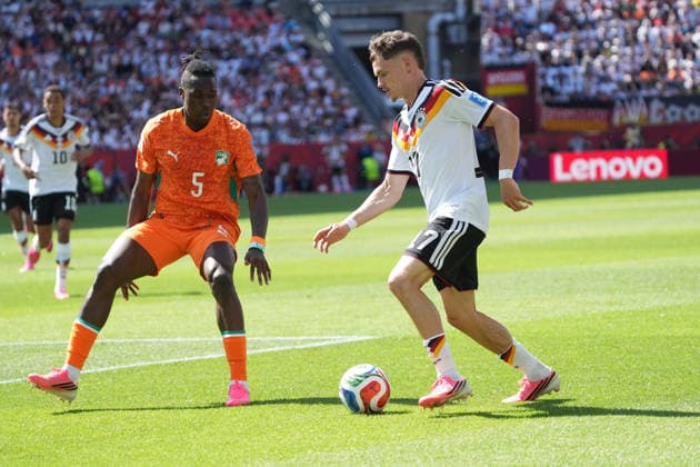Florian Wirtz (Deutschland Germany) gegen Wilfried Sango (Elfenbeinküste, Ivory Coast, Cote d Ivoire, 5) - Toronto 20.06.2026: Deutschland vs. Elfenbeinküste, Toronto Stadium, World Cup 26 Gruppe E 2. Spieltag *** Florian Wirtz (Germany) vs. Wilfried Sango (Ivory Coast, Côte dIvoire), June 20, 2026, Toronto, Germany vs. Ivory Coast, Toronto Stadium, World Cup 26, Group E, Matchday 2,detected_source_language