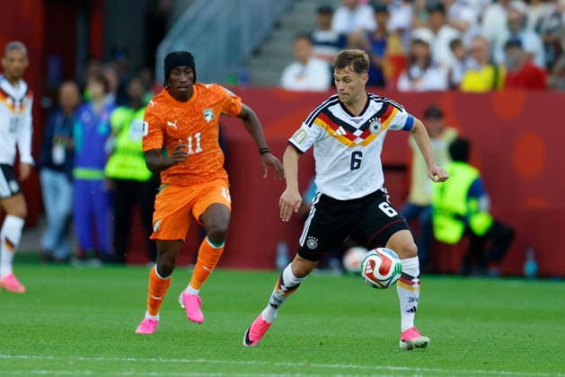 TORONTO STADIUM TORONTO ONTARIO KANADA 20.06.2026 FIFA MISTRZOSTWA SWIATA 2026 W PILKA NOZNA W KANADA MECZ GRUPA E GERMANY I COTE DIVOIRE FIFA World Cup, WM, Weltmeisterschaft, Fussball 2026 Group E match between Germany and CÃ te d Ivoire at Toronto Stadium in Toronto Canada on June 20, 2026 in Toronto, Ontario, Canada. N Z CÃ te d Ivoire forward Yan Diomande (11) Germany midfielder Joshua Kimmich (6) FOT. KAMIL KRZACZYNSKI NEWSPIX.PL --- newspix.pl POLAND OUT!  KSK