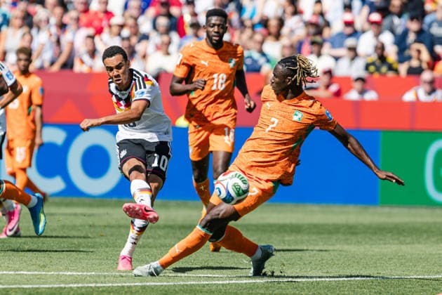 Jamal Musiala of Germany contests with Odilon Kossounou of Ivory Coast during the FIFA World Cup, WM, Weltmeisterschaft, Fussball game between Germany and Ivory Coast at Toronto Stadium on June 20, 2026 in Toronto, Ontario, Canada  Copyright: xCurtisxWongx xSPPx Sportspressphoto_SPR171892