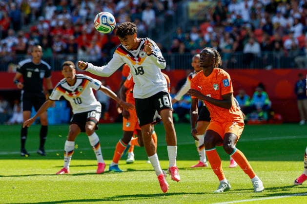 TORONTO STADIUM TORONTO ONTARIO KANADA 20.06.2026 FIFA MISTRZOSTWA SWIATA 2026 W PILKA NOZNA W KANADA MECZ GRUPA E GERMANY I COTE DIVOIRE FIFA World Cup, WM, Weltmeisterschaft, Fussball 2026 Group E match between Germany and CÃ te d Ivoire at Toronto Stadium in Toronto Canada on June 20, 2026 in Toronto, Ontario, Canada. N Z Germany defender Nathaniel Brown (18)CÃ te d Ivoire defender Odilon Kossounou (7) FOT. KAMIL KRZACZYNSKI NEWSPIX.PL --- newspix.pl POLAND OUT!  KSK