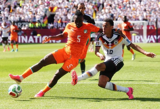 June 20, 2026, Toronto, On, CANADA: Ivory Coast s Wilfried Singo (5) and Germany s Jamal Musiala (10) vie for the ball during the first half of a World Cup Group E soccer match, in Toronto, on Saturday, June 20, 2026. Canada News - June 20, 2026  - ZUMAc35_ 20260620_zaf_c35_093 Copyright: xNathanxDenettex