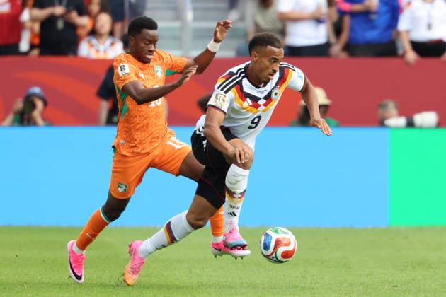 20.06.2026, Fussball, Herren, FIFA Weltmeisterschaft 2026, Vorrunde, Gruppe E, Toronto, Deutschland - Elfenbeinküste, Jamie Leweling (Deutschland), Ibrahim Sangare (Elfenbeinküste) Toronto BMO Field Ontario Kanada (CAN)