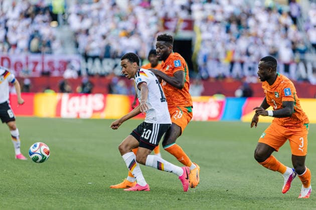 Jamal Musiala of Germany contests with Ibrahim Sangaré of Ivory Coast during the FIFA World Cup, WM, Weltmeisterschaft, Fussball game between Germany and Ivory Coast at Toronto Stadium on June 20, 2026 in Toronto, Ontario, Canada  Copyright: xCurtisxWongx xSPPx Sportspressphoto_SPR172012