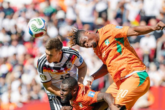 Nico Schlotterbeck of Germany contests a header with Emmanuel Agbadou of Ivory Coast during the FIFA World Cup, WM, Weltmeisterschaft, Fussball game between Germany and Ivory Coast at Toronto Stadium on June 20, 2026 in Toronto, Ontario, Canada  Copyright: xCurtisxWongx xSPPx Sportspressphoto_SPR172013