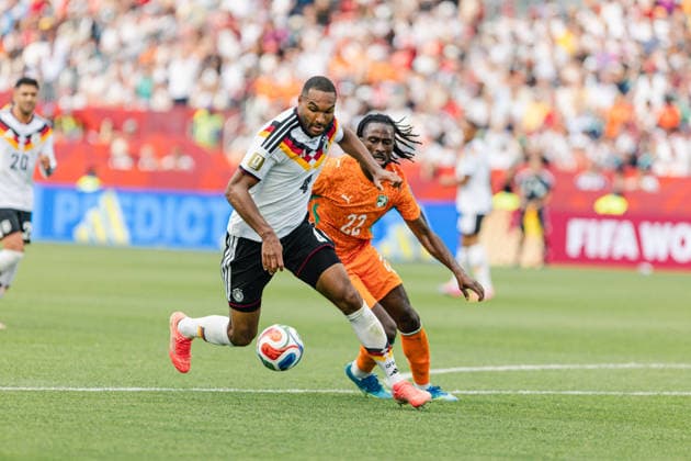 Jonathan Tah of Germany contests with Evann Guessand of Ivory Coast during the FIFA World Cup, WM, Weltmeisterschaft, Fussball game between Germany and Ivory Coast at Toronto Stadium on June 20, 2026 in Toronto, Ontario, Canada  Copyright: xCurtisxWongx xSPPx Sportspressphoto_SPR172078